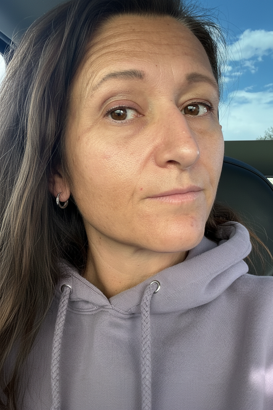 close up of a woman's face wondering why her skin looks older