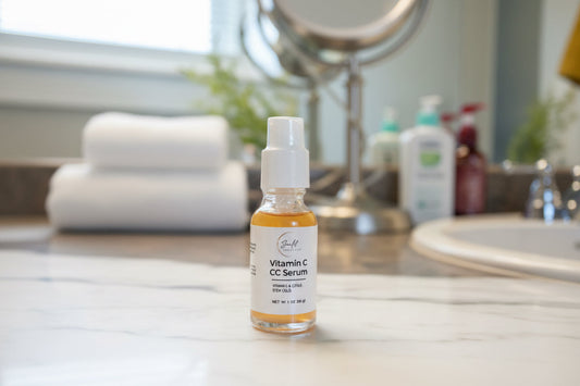 Sunlit Vitamin C serum bottle on a bathroom counter